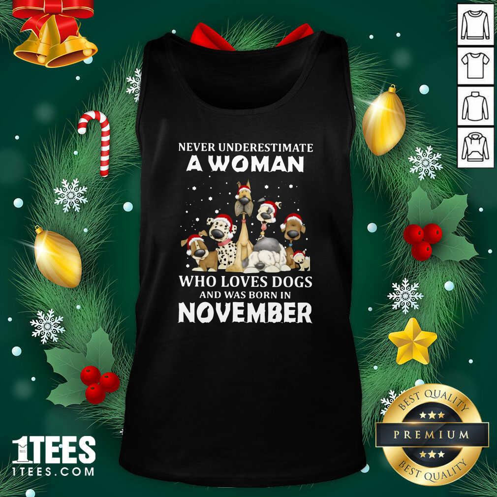 Never Underestimate A Woman Who Loves Dogs And Was Born In November Christmas Tank Top- Design By 1Tees.com