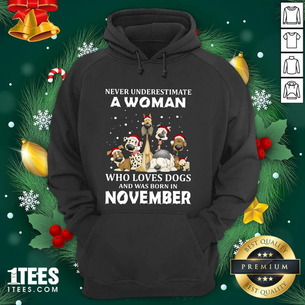 Never Underestimate A Woman Who Loves Dogs And Was Born In November Christmas Hoodie- Design By 1tees.com