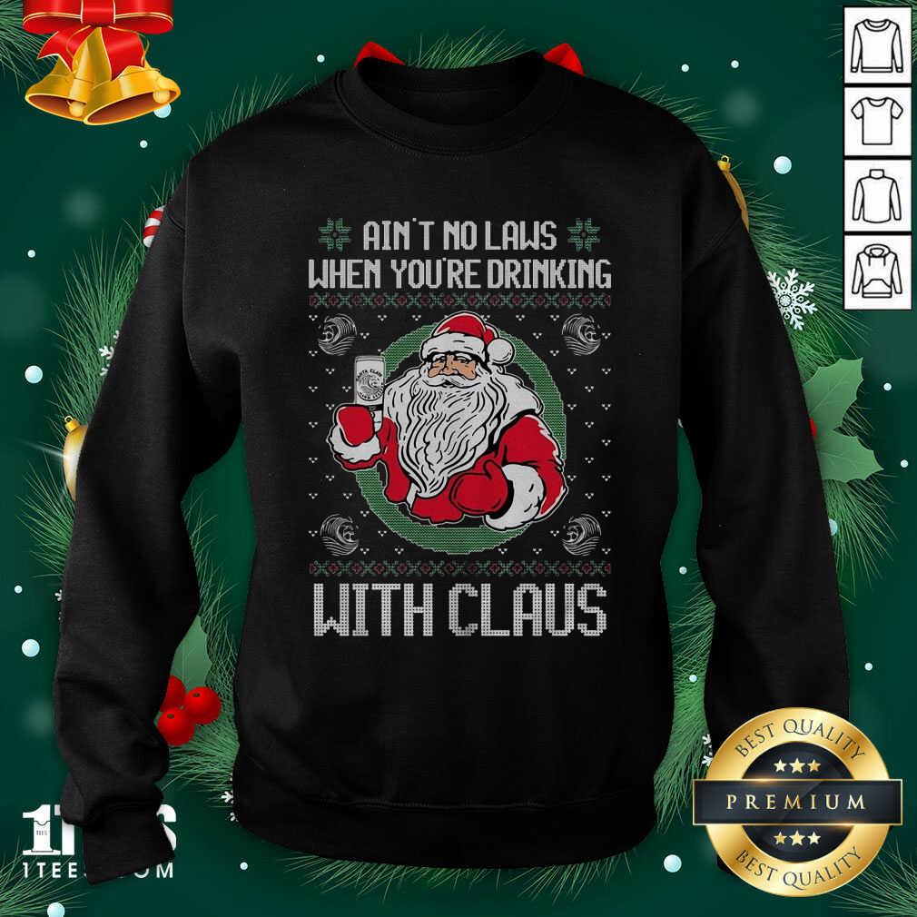 Ain’t No Laws When You’re Drinking With Claus Ugly Merry Christmas Sweatshirt- Design By 1Tees.com